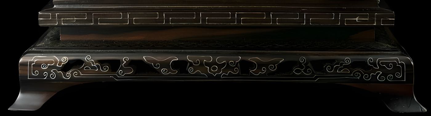 Chinese Carving in its display case: Decorative Paint Applications