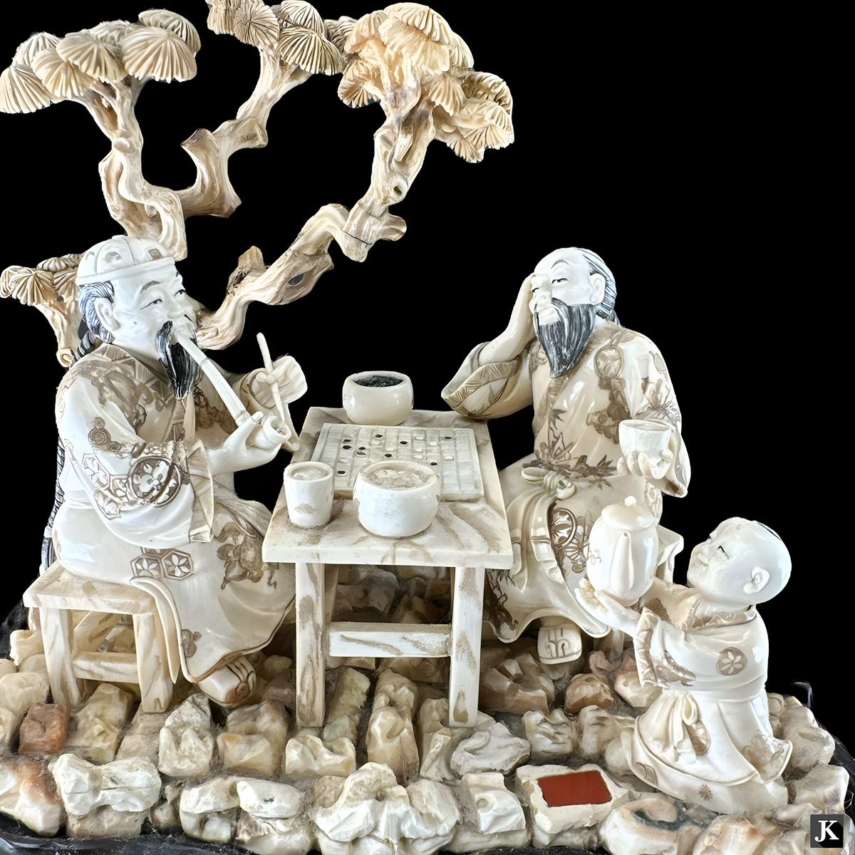 Chinese Carving in its display case: Thematic Composition
