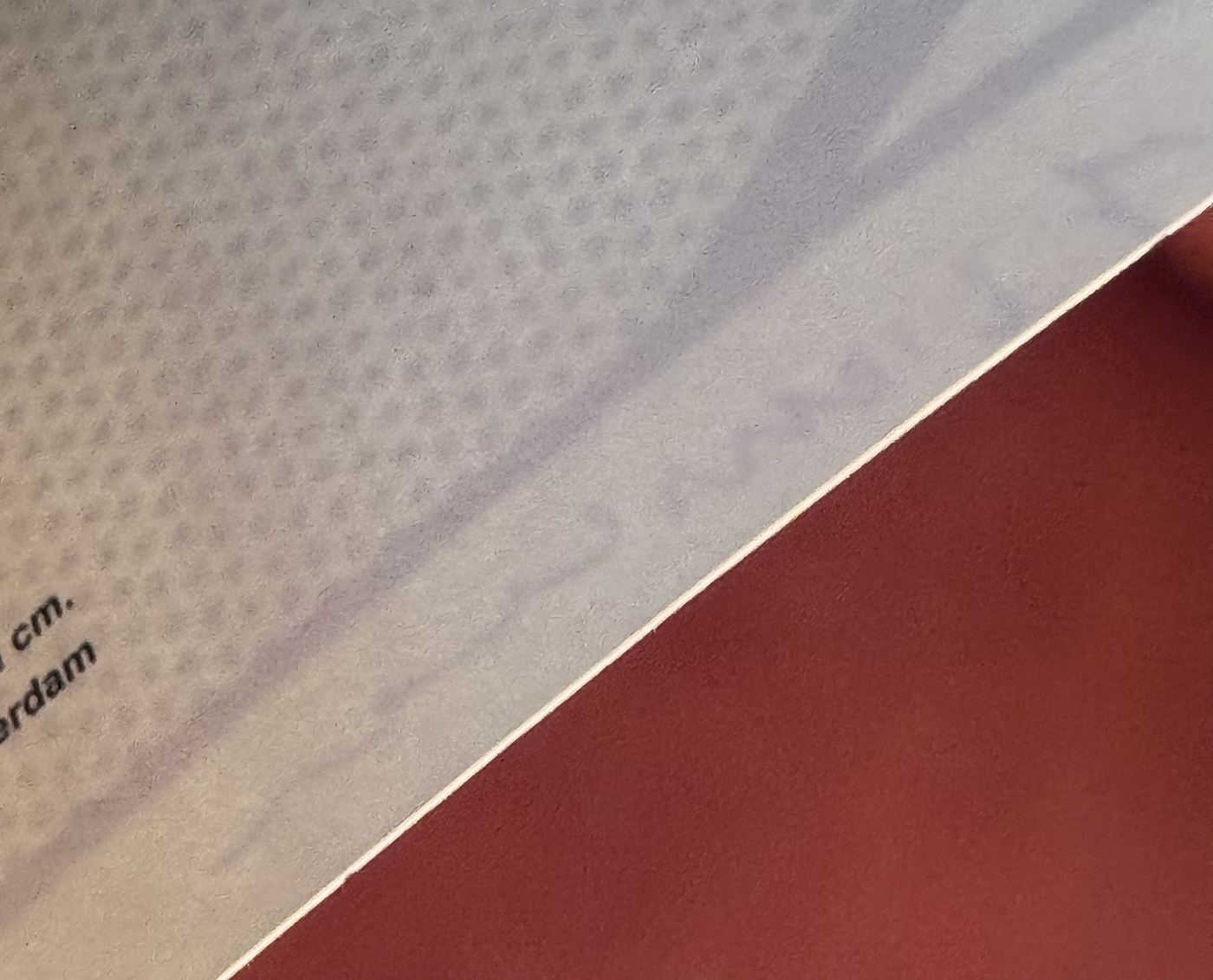 Framed triptych: Absence of Embossing on the Verso